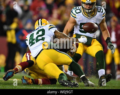 Washington Redskins wide receiver DeSean Jackson (11) ist Sein von Green Bay Packers starke Sicherheit Morgan Burnett (42) im ersten Quartal bei FedEx Field in Landover, Maryland am 20. November 2016. Stockfoto