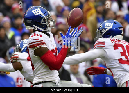 New York Giants wide receiver Jawill Davis (80) Bommeln den Pass von New York Giants Quarterback Eli Manning in der ersten Jahreshälfte ein NFL Spiel bei FedEx Field in Landover, Maryland, 9. Dezember 2018. Foto von David Tulis/UPI Stockfoto