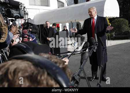 Us-Präsident Donald Trump spricht mit den Medien auf dem Südrasen des Weißen Hauses in Washington am 29. November 2018 vor seiner Abreise für die Staats- und Regierungschefs der G20-Gipfel in Buenos Aires, Argentinien. Foto von Yuri Gripas/UPI Stockfoto