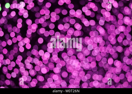 Magenta Farbe abstract Blur und Bokeh buntes Licht innen und Nacht Garten Hintergrund Stockfoto