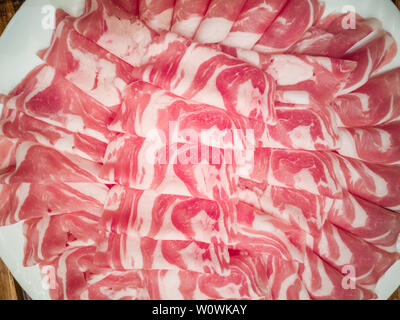 Ein ordentlich platziert raw hot pot Lamm rollen. Stockfoto