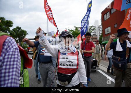 Osaka, Japan. Juni 28, 2019 - März während eines Protestes in der Nähe des G20-Gipfels in Osaka, Japan. Credit: Ben Weller/LBA/Alamy leben Nachrichten Stockfoto