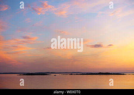 Sonnenuntergang über dem Murray Inseln von Carrick, Dumfries and Galloway, Schottland Stockfoto