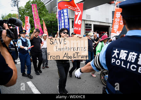 Juni 28, 2019 - Demonstranten März und halten Sie während der G20-Gipfel in Osaka, Japan. Credit: Ben Weller/LBA/Alamy leben Nachrichten Stockfoto