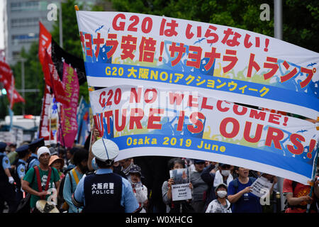 Juni 28, 2019 - Demonstranten März und halten Sie während der G20-Gipfel in Osaka, Japan. Credit: Ben Weller/LBA/Alamy leben Nachrichten Stockfoto