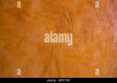 Hintergrund der warmen Orangetönen mit Relief Stockfoto