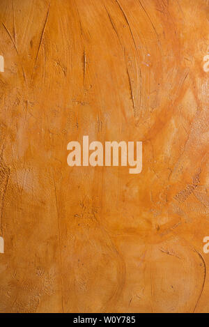 Hintergrund der warmen Orangetönen mit Relief Stockfoto