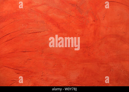 Hintergrund von warmen Rottönen mit Relief Stockfoto
