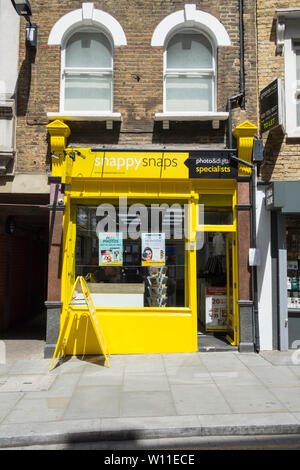 Snappysnaps shop auf Cowcross Street, Smithfield, London, UK Stockfoto