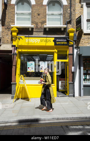 Snappysnaps shop auf Cowcross Street, Smithfield, London, UK Stockfoto