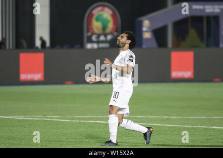 Kairo, Ägypten. 30. Juni, 2019. Ägyptens Mohamed Salah reagiert während der 2019 Afrika Cup der Nationen ein Fußballspiel zwischen Ägypten und Uganda im Cairo International Stadium. Credit: Omar Zoheiry/dpa/Alamy leben Nachrichten Stockfoto