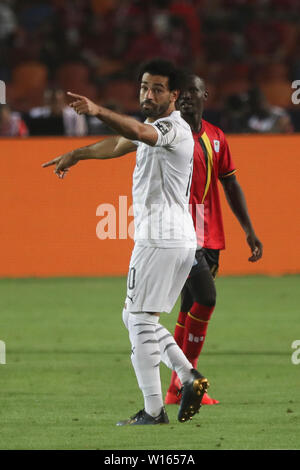 Kairo, Ägypten. 30. Juni, 2019. Ägyptens Mohamed Salah reagiert während der 2019 Afrika Cup der Nationen ein Fußballspiel zwischen Ägypten und Uganda im Cairo International Stadium. Credit: Omar Zoheiry/dpa/Alamy leben Nachrichten Stockfoto