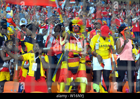 Kairo, Ägypten. 30. Juni, 2019. Unterstützer von Uganda während des Spiels Ägypten vs Uganda Gruppe insgesamt Afrika Cup der Nationen Ägypten 2019 im Cairo International Stadium. Foto: Chokri Mahjoub. Credit: Chokri Mahjoub/ZUMA Draht/Alamy leben Nachrichten Stockfoto