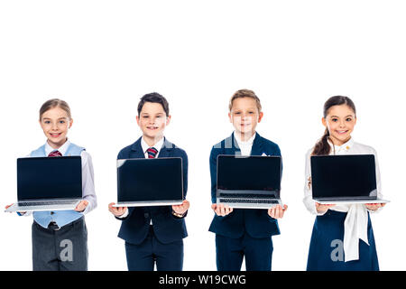Schüler vorgibt, Geschäftsleute mit Laptops mit leerer Bildschirm isoliert auf Weiss sein Stockfoto
