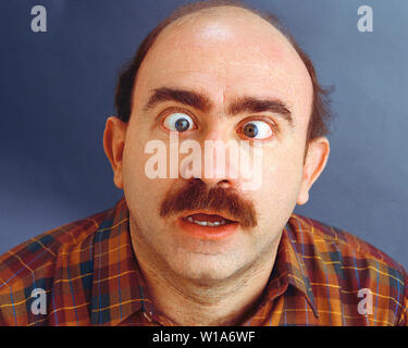 Crosseyed Mann Stockfoto
