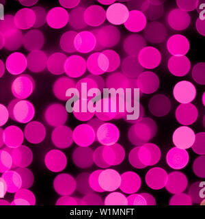Unfocused abstrakte farbenfrohe Bokeh violetten Hintergrund. Defokussierten und unscharf viele Runde lila Licht. Stockfoto