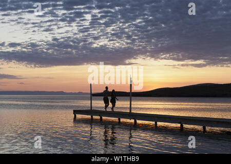 Jetty und Meer bei Sonnenuntergang, La Paz, Baja California Sur, Mexiko Stockfoto