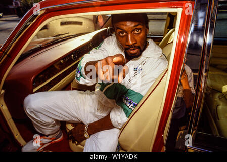 London, 1990. Portrait von Boxer Nigel Benn. Den Spitznamen der Dunkle Zerstörer, er hielt den WBO-Titel im Mittelgewicht im Jahre 1990, und der Wbc im Supermittelgewicht t Stockfoto