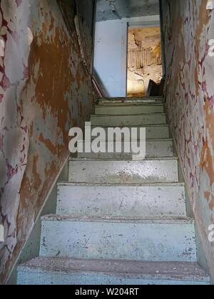 Alte Treppe eines 1880s Hotel Gebäude in South Dakota. Stockfoto