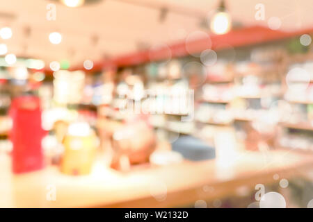 Blur Shopping mall Hintergrund mit bokeh Licht, goldene Farbe Hintergrund Stockfoto