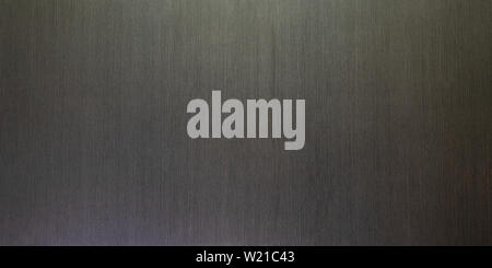 Dunkel grau braun Holz- Panel panorama Textur für den Bau oder die Einrichtung mit einer vertikalen Holzmaserung Streifenmuster Stockfoto