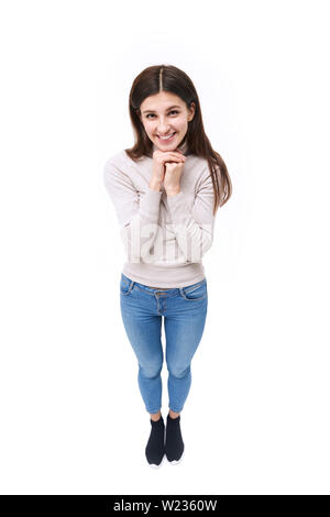 Studio Porträt einer wunderschönen kaukasische Frau, in die Kamera lächeln suchen, hohen Winkel auf weißem Hintergrund Stockfoto