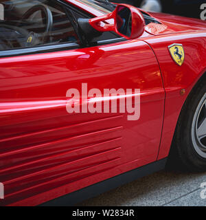 London, UK - June, 2019. Detail of a vintage red Ferrari Testarossa parked along Bond Street, the luxury retail street in central London. Stockfoto