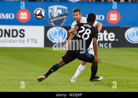 Montreal, QC, Kanada. 06 Juli, 2019. Minnesota United FC Mittelfeldspieler Collin Martin (17) den Ball neben Montreal Impact Mittelfeldspieler Shamit Shome (28) Während der Minnesota United FC am Montreal Impact Spiel bei Saputo Stadium in Montreal, QC, Kanada. David Kirouac/CSM/Alamy leben Nachrichten Stockfoto