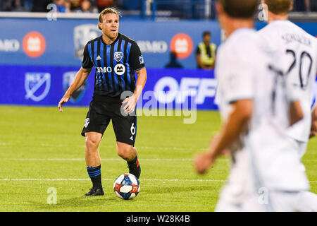 Montreal, QC, Kanada. 06 Juli, 2019. Montreal Impact Mittelfeldspieler Samuel Piette (6) sieht auf seine Optionen, die bei der Minnesota United FC am Montreal Impact Spiel bei Saputo Stadium in Montreal, QC, Kanada. David Kirouac/CSM/Alamy leben Nachrichten Stockfoto