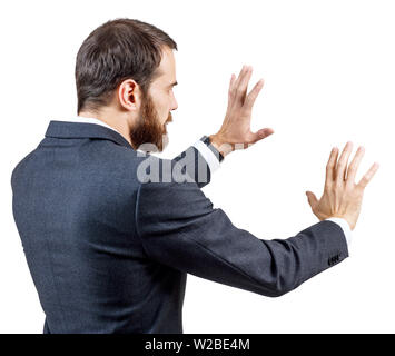 Geschäftsmann in Anzug zeigt ausgestreckte Hand withspread Finger. Stockfoto