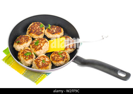 Pfanne mit gebratenem Fleisch Frikadellen auf weiße Platte Stockfoto