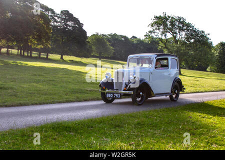 1938 30s dreißiger Jahre grauer Austin 7 885 ccm, bei der Classic Car Rally im Hochsommer-Oldtimer-Show reiste zum malerischen Carnforth, um auf der diesjährigen Leighton Hall Transport Show in Großbritannien mehr als 30s Klassiker, historische, Vintage-Motoren und Sammlerstücke zu präsentieren Stockfoto