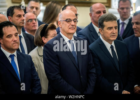 Athen, Griechenland. 09 Juli, 2019. Nikos Dendias (M), Neu ernannte griechische Außenminister nimmt Teil an der Vereidigung der neuen griechischen Kabinett im Präsidentenpalast. Credit: Angelos Tzortzinis/dpa/Alamy leben Nachrichten Stockfoto