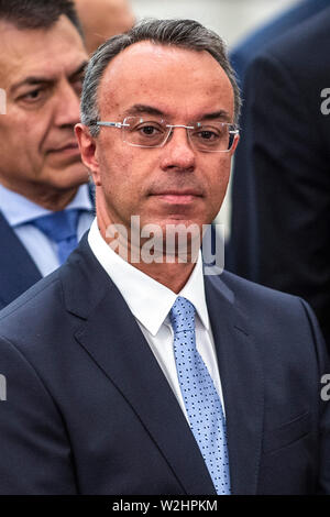Athen, Griechenland. 09 Juli, 2019. Christos Staikouras, neu ernannte der griechische Finanzminister (M), beteiligt sich an der Vereidigung der neuen griechischen Kabinett im Präsidentenpalast. Credit: Angelos Tzortzinis/dpa/Alamy leben Nachrichten Stockfoto