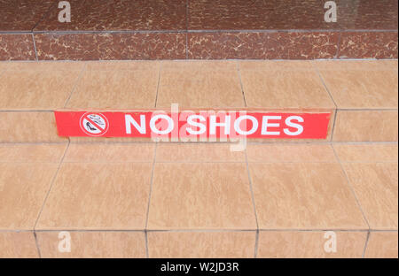 Symbol der keine Schuhe auf der Treppe. Stockfoto
