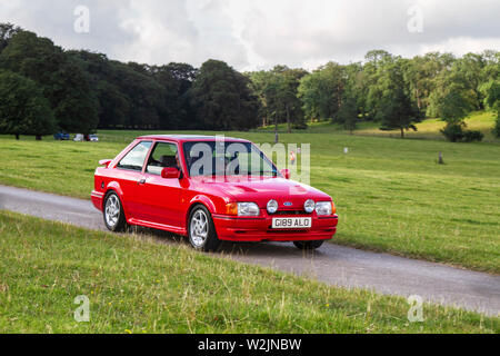 1990 90s Neunzigers Red Ford Escort RS Turbo bei der Classic Car Rally am Sonntag, 7.. Juli 2019. Mark Woodwards Oldtimer-Show im Hochsommer reiste zum malerischen Carnforth, um auf der diesjährigen Leighton Hall Transport Show weitere Klassiker, historics, Oldtimer-Motoren und Sammlerstücke zu präsentieren. Eine Gelegenheit, mehr als 500 Oldtimer vergangener Zeiten auf einer der umfangreichsten und vielfältigsten Automobilausstellungen des Sommer-Oldtimer-Events zu sehen. Stockfoto