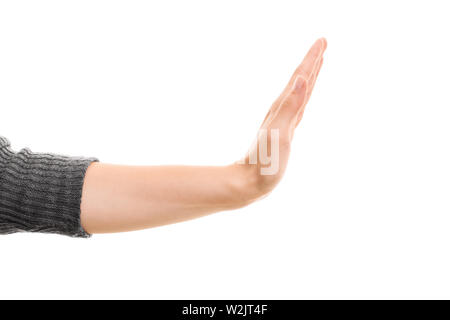 Eine Nahaufnahme einer Hand gestikulierend stoppen, auf weißem Hintergrund. Stockfoto