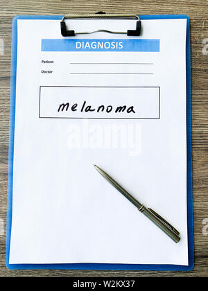 Diagnose Melanom in eine medizinische Form auf den Doktor Schreibtisch Stockfoto