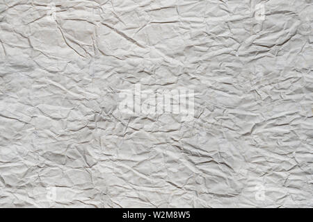 Nahaufnahme der Textur von Zerknitterten altes Papier. Vintage Hintergrund. Stockfoto