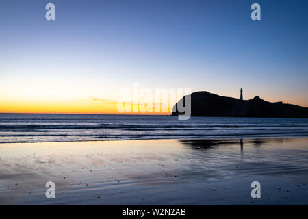 Vor der Dämmerung Licht über dem Pazifischen Ozean am Castlepoint, Wairarapa, North Island, Neuseeland Stockfoto