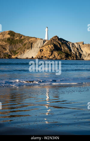 Leuchtturm auf der Landspitze, Castlepoint, Wairarapa, North Island, Neuseeland Stockfoto