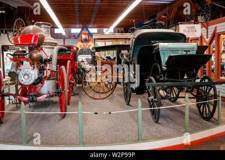 Antike Kutschen, die auf Mackinac Island nun in einer Ausstellung verwendet wurden. Stockfoto