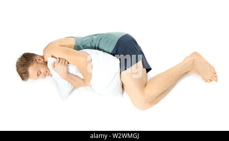 Schönen schlafenden Mann auf weißem Hintergrund Stockfoto