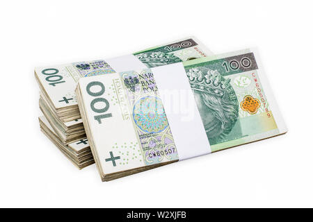 Bundles der polnischen 100 zloty Banknoten. Auf weiß isoliert. Beschneidungspfad enthalten. Stockfoto