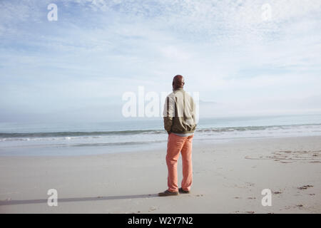 Afrikaner - der Mann, der am Strand Stockfoto