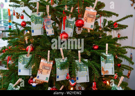 Weihnachtsbaum, Spende, Geschenk des Geldes Stockfoto