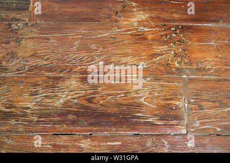 In der Nähe eines alten und gebrauchten Holzboden mit Rissen und mit einigen arrangiert Fehler Stockfoto