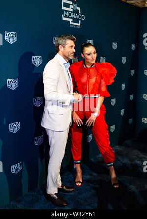 TAG Heuer feiert 50 Yerars von Ikonischen Modell Monaco mit Patrick Dempsey und Olivia Culpo Stockfoto