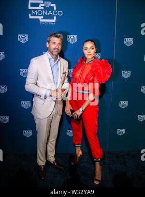 TAG Heuer feiert 50 Yerars von Ikonischen Modell Monaco mit Patrick Dempsey und Olivia Culpo Stockfoto