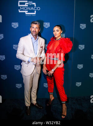 TAG Heuer feiert 50 Yerars von Ikonischen Modell Monaco mit Patrick Dempsey und Olivia Culpo Stockfoto